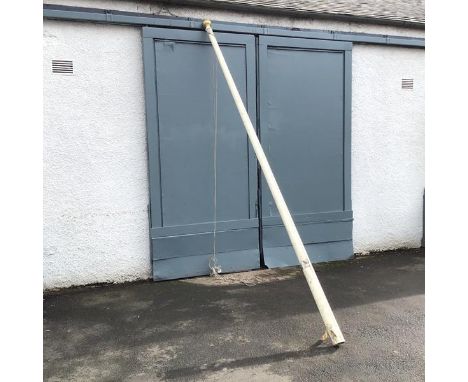 A fibre glass flagpole, with ropes and brass urn finial (h.423cm)