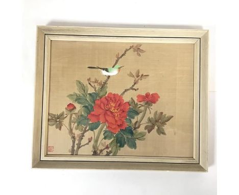 A Chinese watercolour on silk depicting a Bird above Blooming Peonies, red seal bottom left (29cm x 36cm)