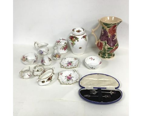 A collection of 1930s Royal Crown Derby including a sugar bowl, milk jug, salt and pepper shaker, scalloped dishes etc., also