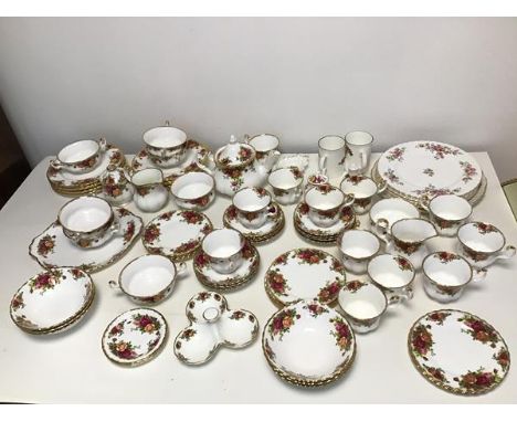 A collection of Royal Albert Old Country Rose pattern china, including teapot, sugar bowl, creamer, soup bowls, fruit bowls, 