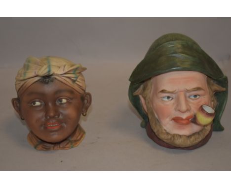 Ceramic lidded jars in the form of heads possibly by Bernard Bloch pottery