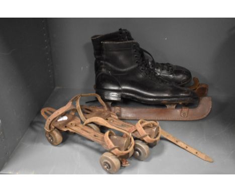Early 20th century roller skates and ice skates