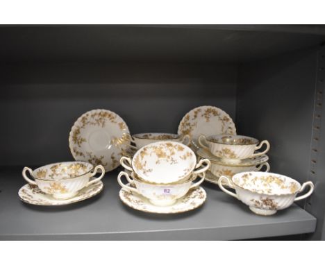 A set of eight Mintons 20th century soup cups and saucers in the Ancestral pattern
