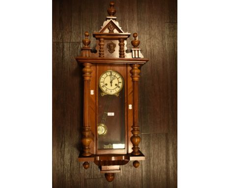 Edwardian Vienna style wall clock with stained wood case and enamel dial