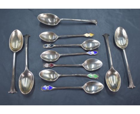 A group of six 1930's silver and enamel coffee spoons, the terminals engine-turned and guilloche enamelled with geometric des