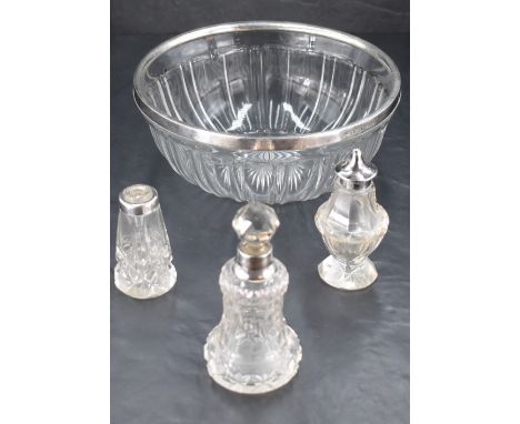 A George V silver rimmed cut-glass bowl, the plain rim over a fluted body and star-cut base, 19.5cm diameter, marks for Birmi