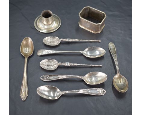 A Group of mixed silver items, comprising spoons, napkin ring and candlestick sconce, various dates and makers, gross silver 