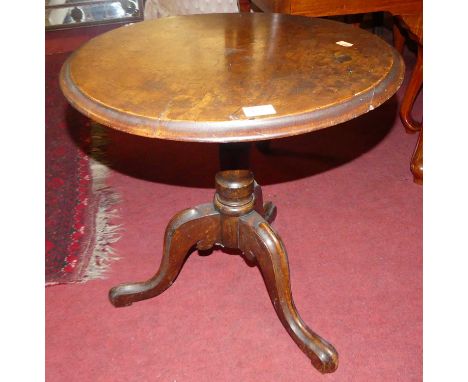 A Victorian figured walnut circular low pedestal tripod table (reduced in height), dia.47cm