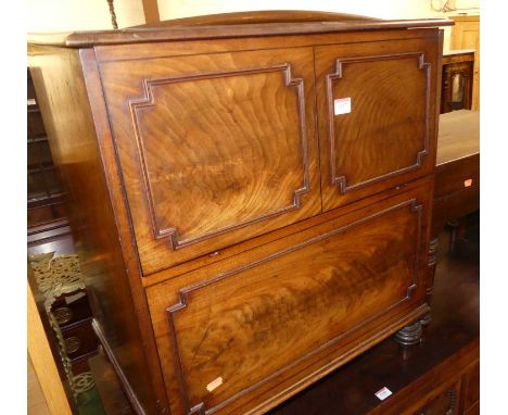 An early 19th century hinge topped commode, with fitted interior, on squat turned supports, w.61cm; together with a further V