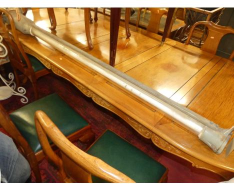 A mid-20th century industrial cast metal torpedo factory light, ceiling mounted, with cylindrical glass tube, length 200cm