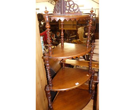 A Victorian mahogany spiral turned four-tier bowfront corner graduated whatnot; together with a late Victorian walnut three-t