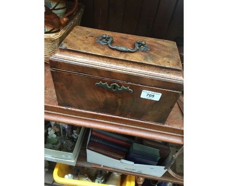 A Georgian mahogany tea caddy with brass handle and escutcheon, length 26cm. 