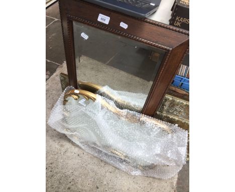 An oak framed mirror and a gilt framed mirror 