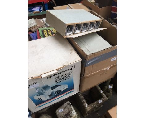 A Hanimex La Ronde RF 35mm projector, wired remote, boxed + 7 X 120 carousels, 10 Agfa slide carriers in original boxes, a Sp