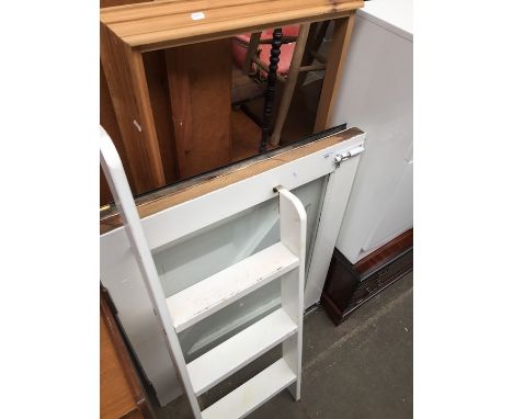 A stable door in two parts, a pine cornice and a ladder. 