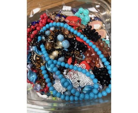 A box of misc vintage and modern necklaces 