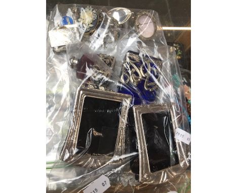 Three vintage scent bottles and two picture frames 
