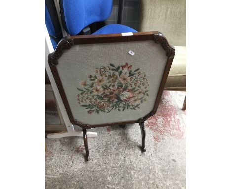 A mahogany tapestry picture fire screen 
