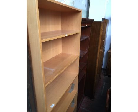 A modern light wood effect bookcase 