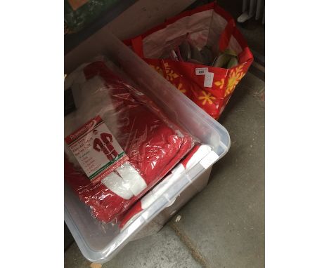A bag of roller skates and crate of Santa outfits 