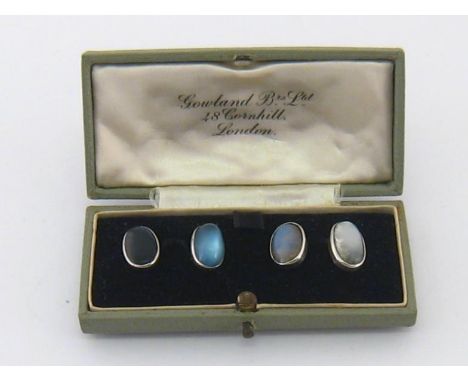 A pair of moonstone cufflinks, the oval cabochon stones mounted in white metal (tests silver), 7.9gmsMatched pair. One link w