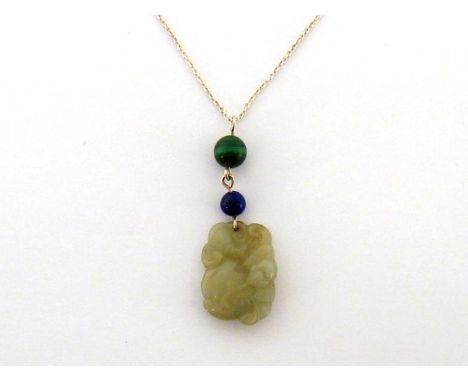 A small carved jade pendant, modelled as a peach and a bat, for long life and happiness, 2.5cm long, with a malachite and lap