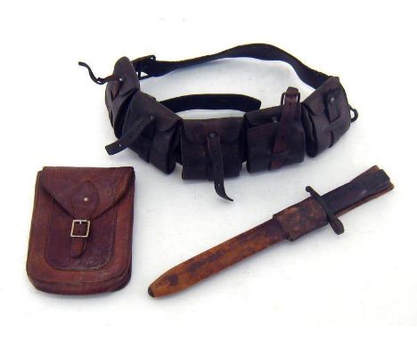 Militaria. A heavy leather WW II Swedish army bandolier with five pouches, a leather belt pouch and a bayonet stamped “Ross R