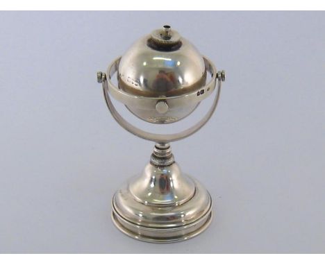 A late Victorian silver gimbal table lighter by William Frederick Wright, London, 1898, on domed pedestal base, 13 cm. highGo