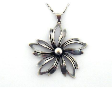 A 1960s Danish silver pendant by Neils Erik From (1908-1986), modelled as a stylised flower, signed and stamped 'STERLING DEN