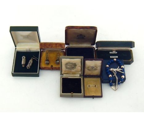 Seven vintage and modern jewellery cases, three with fashion jewellery contents. 
