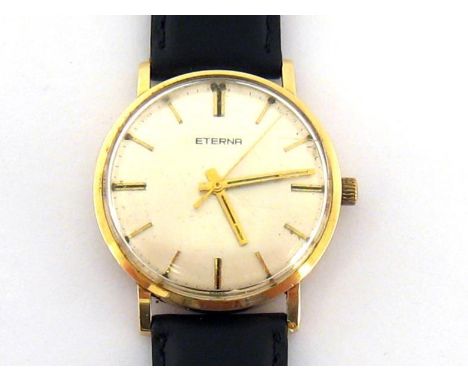 Eterna, a 1960s gentleman's 14 carat gold manual wind wristwatch, the silvered dial with baton numerals and hands, the 17 jew