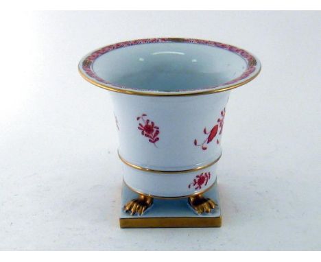 Herend. A campana shaped ceramic vase on four claw feet in white with light red floral decoration., Herend hand painted blue 