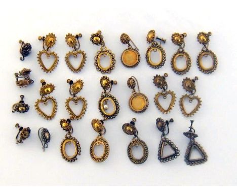 A mixed lot of silver gilt earrings, of Eastern design, some stamped ‘STERLING’, 89gms 