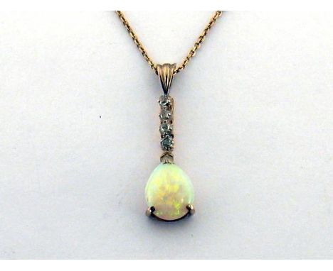 An opal and diamond pendant, the pear shaped opal 11.2 x 8.7mm, below a rose cut connection, mounted in white metal (tests 18