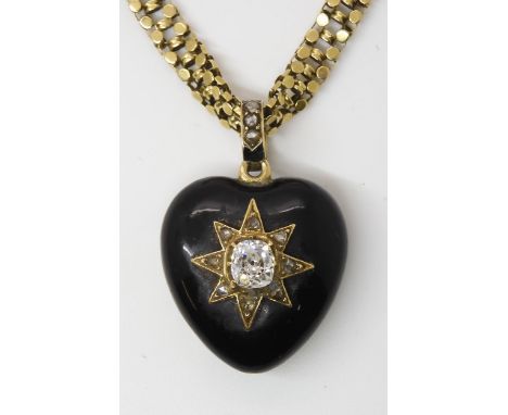 A VICTORIAN MOURNING LOCKET AND CHAIN set with an old cushion cut diamond of estimated approx 0.85cts, the yellow metal locke