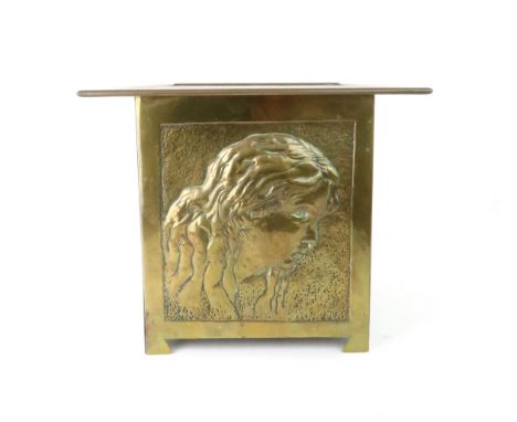 A GLASGOW SCHOOL ARTS AND CRAFTS PLANTER of square form, two sides decorated with repousse bunches of violets, with a further