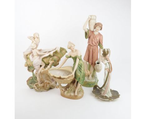 A ROYAL DUX ART NOUVEAU CENTREPIECE depicting maidens seated upon a conch shell, stamped 1066, 37cms tall, another of a singl