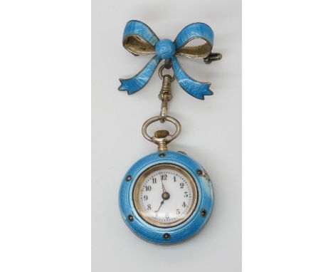 AN ENAMELLED BROOCH PENDANT WATCH enamelled in turquoise guilloche enamel, the bezeland the back are both set with pearls, th