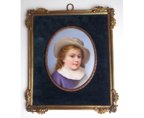 A CONTINENTAL PORCELAIN PORTRAIT PLAQUE depicting a child wearing a hat in gilt-metal frame, 12.5 x 10cm Condition Report:Ava