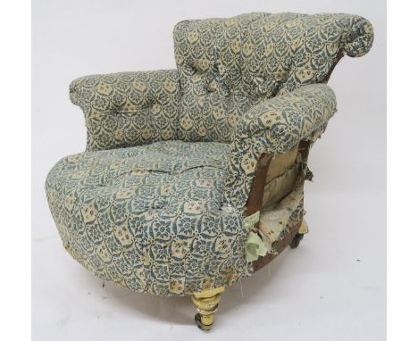 A 19TH CENTURY BUTTON BACK TUB ARMCHAIR upholstered in Howard &amp; Sons monogram-print fabric on giltwood supports, stamped 