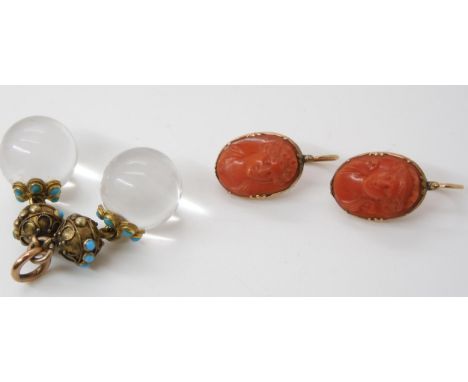 TWO VICTORIAN JEWELS a yellow metal mounted double crystal ball pendant, the decorative mounts set with turquoise and wire wo