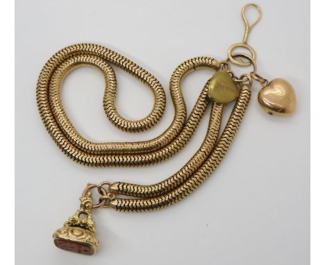 A BRIGHT YELLOW METAL SNAKE CHAIN FOB with attached yellow metal carnelian fob seal, intaglio engraved with 'A vous seul de m