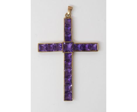 A GOLD &amp; AMETHYST CROSS the square cut amethysts are set into a galleried mount, stamped 9c to the bail, length 5.6cm x 3