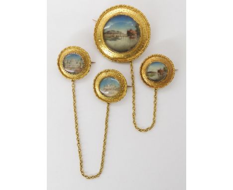 INDIAN MINIATURES DOUBLE BROOCHESpainted with four Indian Scenes to include The Taj Mahal, mounted as separate brooches joine
