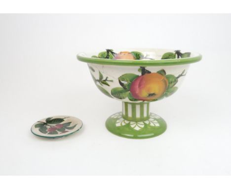 A WEMYSS FOOTED BOWL painted with apples within a green rim, impressed mark to base, 14cm high, together with a cherry painte
