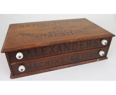A R.F. &amp; J. ALEXANDER &amp; CO., LTD STAINED PINE COUNTER REEL CHEST the front with two drawers inscribed Alexanders' Mac