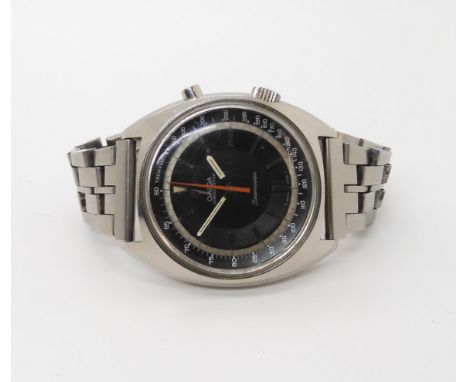 AN OMEGA CHRONOSTOP SEAMASTER black dial with silvered chapter ring and baton numerals, with sweeping orange seconds hand. Di