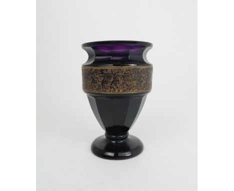 A MOSER KARLSBAD VASE the amethyst glass with gilded panel of warriors, signed to base, 15.5cm high Condition Report:There is
