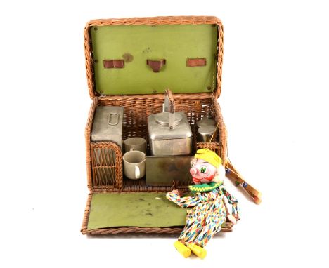 Pelham Puppet clown, boxed, along with a vintage wicker picnic basket with interior, 36cm length.