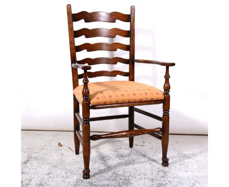 Elm and ash ladder-back elbow chair, 19th Century, shaped arms, upholstered drop-in seat, turned legs and rails, 61cm.